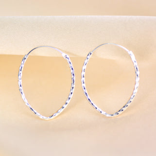 Sterling Silver Textured Oval Hoop Earrings