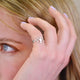 Silver Tree of Life Ring shown close up on model