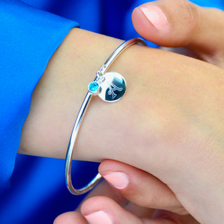 Sterling Silver bangle with engraved circle disc and sterling silver birthstone