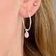 Sterling Silver Teardrop Birthstone Hoop Earrings shown close up with October birthstone
