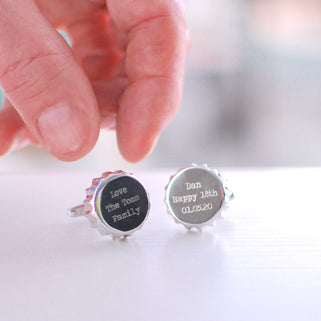 Bottle Top Cufflinks with "Dan Happy 18th 01.05.20" on the left and "Love The Toms Family" Engraved on the right cufflink shown in close up shot