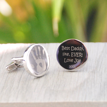 Round Silver Cufflinks, left one with handprint engraved and right one with 