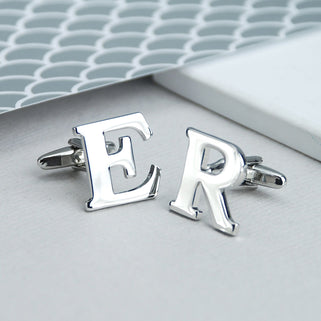 Personalised alphabet cufflinks in "E" and "R" shown in close up shot