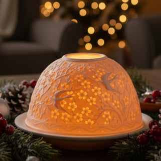 Decorative candle holder with a warm glow on a festive background