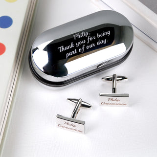 Oval chrome cufflinks box with personalised message "Philip, Thank you for being part of our day." engraved and matching rectangle cufflinks with "Philip Groomsman" engraved on both cufflinks.