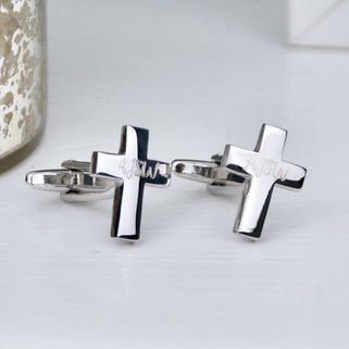 Cross Cufflinks  with "AJSW" engraved in script font on both cufflinks shown in close up shot.