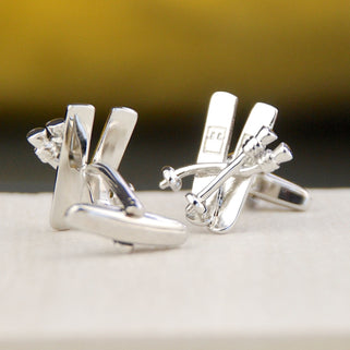 silver ski cufflinks shown in close up shot