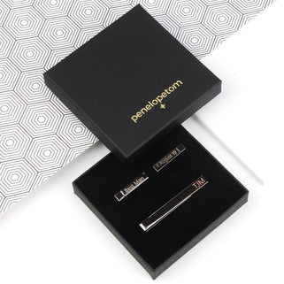 Gunmetal personalised cufflinks and tie slide set shown in black Penelopetom box