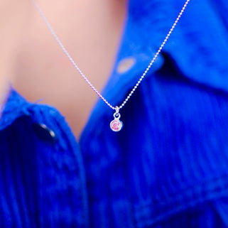 Sterling Silver Mini June Alexandrite Birthstone Charm Necklace shown on model close up