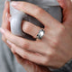 Cherish Sterling Silver Heart and Gemstone Spinning Ring shown being worn on models hand.