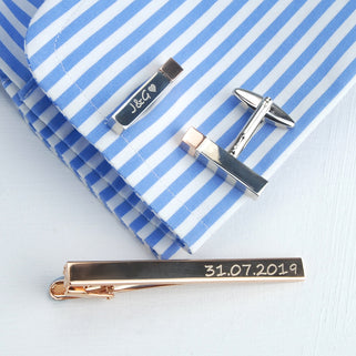 Tie clip and bar cufflink set. Rose gold tie clip with personalised message "31.07.2019" engraved on right side and silver bar cufflinks with rose gold tips with "J&G heart" engraved at the end of the cufflink