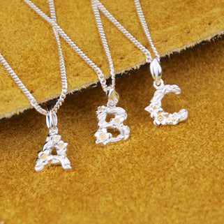 Sterling Silver Flower Charm Initial Necklace