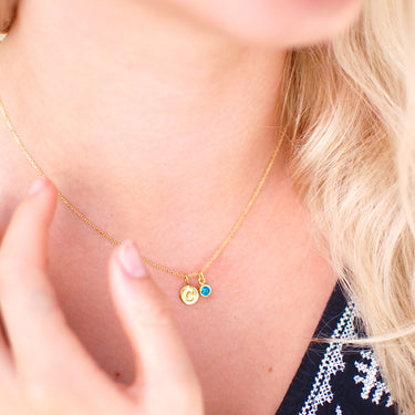 Gold Vermeil Mini Initial C and December/Blue Topaz Birthstone Necklace shown on model