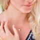 Gold Vermeil Mini Initial C and December/Blue Topaz Birthstone Necklace shown on model
