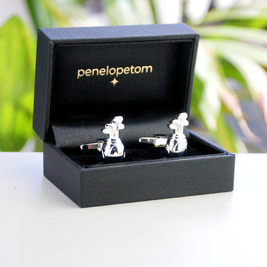 Silver golf club cufflinks shown in black Penelopetom cufflinks box