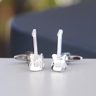 Electric guitar cufflinks shown in close up shot