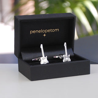 Electric guitar cufflinks shown in black Penelopetom cufflinks box