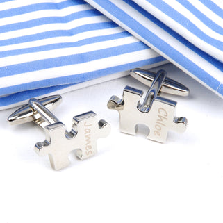 Personalised 'Missing Piece' Jigsaw Cufflinks. Left cufflink with "James" engraved and right with "Chloe" engraved