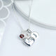 Sterling Silver Heart Necklace with J Initial disc and Ruby July birthstone shown close up