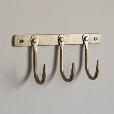 Kuna Three-Hook Brass Rail