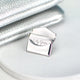 Close up shot of envelope pin open showing part of personalised letter message