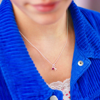  Sterling Silver Script Initial S and July Ruby Birthstone Necklace shown on model close up