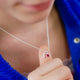 Sterling Silver Script Initial S and July Ruby Birthstone Necklace shown on model close up