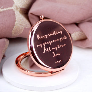 Rose Gold Bridesmaid Compact Mirror with "keep smiling my gorgeous girl All my love Jen xxxx" engraved in the centre, shown in close up shot