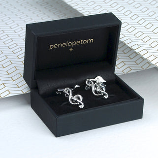 Treble clef music note cufflinks shown in black Penelopetom cufflinks box