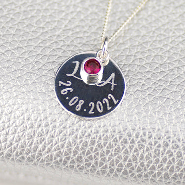 Sterling Silver Celebration Necklace. Silver round disc with 