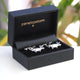 Silver pig cufflinks shown in black Penelopetom cufflinks box
