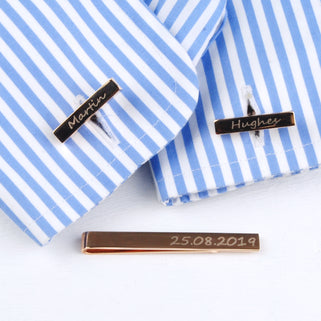 Rose gold tie slide and cufflinks set with "Martin" and "Hughes" engraved on the cufflinks and "25.05.2019" on the tie slide. 