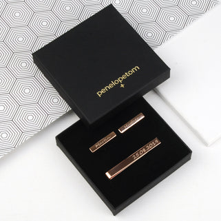 Rose gold tie slide and cufflinks set shown in black Penelopetom gift box.