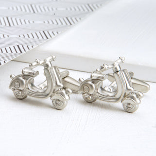 Silver scooter cufflinks shown in close up shot
