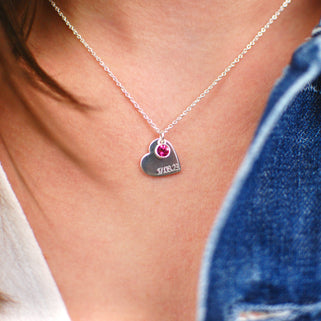 Personalised Heart and Birthstone Necklace with "17.08.23" Engraved on Silver Heart and October/Tourmaline Birthstone shown close up on model