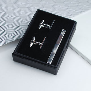 Silver cufflinks and tie clip set shown in black gift box