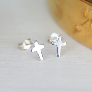 Pair of Sterling Silver Tiny Cross Stud Earrings shown in close up shot