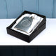 Silver hip flask with engraved spiral message on the front shown in black  gift box. 