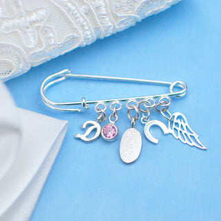  Sterling Silver Wedding Keepsake Charm Pin with script letter "D" initial, June/Alexandrite birthstone, engraved oval disc "21.9.22", horse shoe charm and angel wing charm shown in close up shot