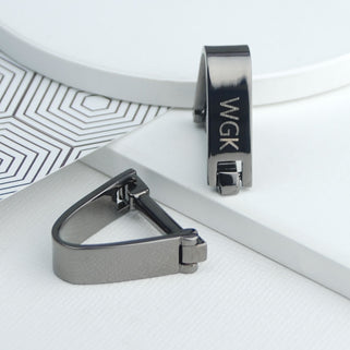 Contemporary Wrap Cufflinks with personalised "WGK" engraved shown in close up shot
