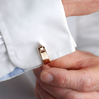 Contemporary Wrap Cufflinks with personalised "Usher" engraved shown on close up on model